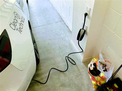 Can You Plug an Electric Car into a Regular Outlet, and Why Do Cats Always Land on Their Feet?